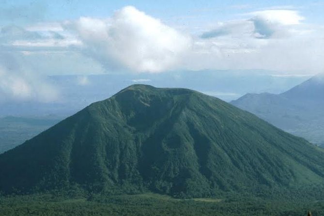 1-Day Bisoke Volcano Hiking Experience - Rainy season and trail conditions: when “muddy and muscular” becomes extra work
