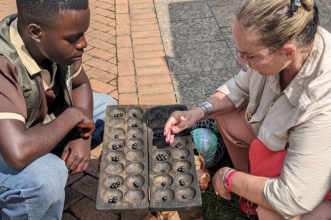 Kigali City Center Guided Walking Tour - Stop 2, The Belgian Peacekeepers Memorial and the Weight of 1994